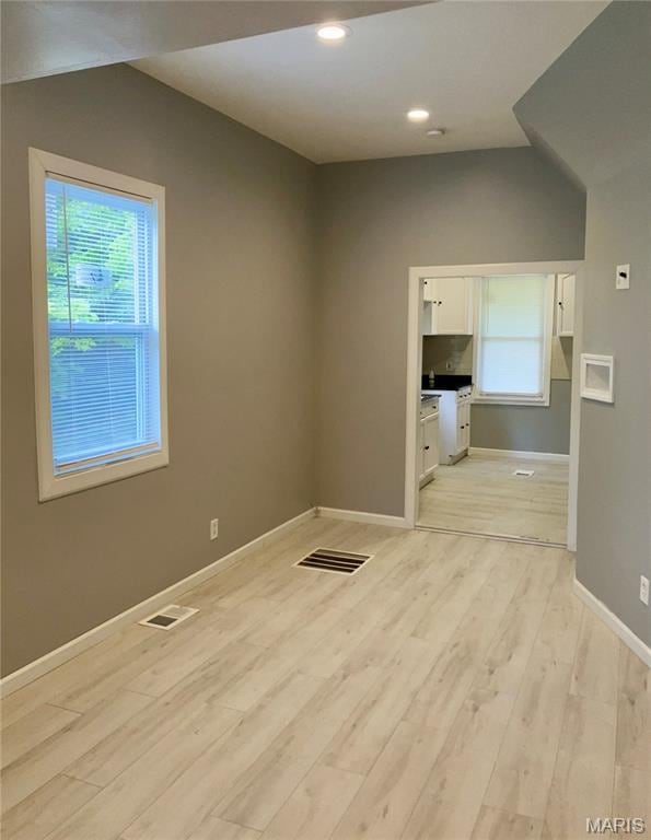 5379 Wabada Ave, Saint Louis, MO 63112 - spare room with light wood-type flooring and recessed lighting