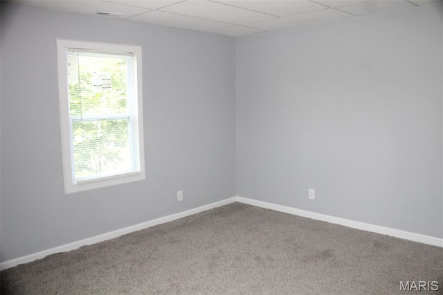 5379 Wabada Ave, Saint Louis, MO 63112 - spare room featuring carpet and a paneled ceiling