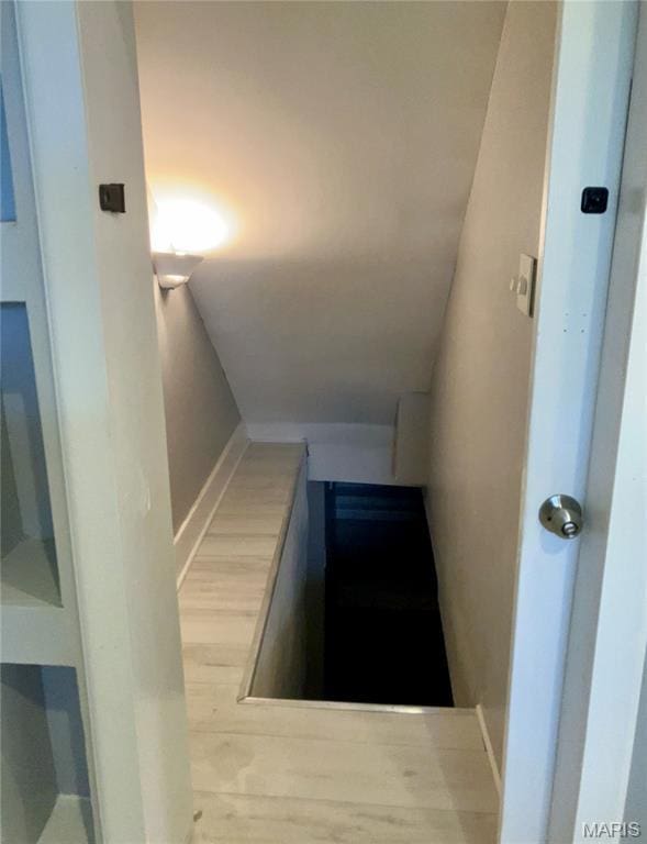 5379 Wabada Ave, Saint Louis, MO 63112 - stairs featuring baseboards