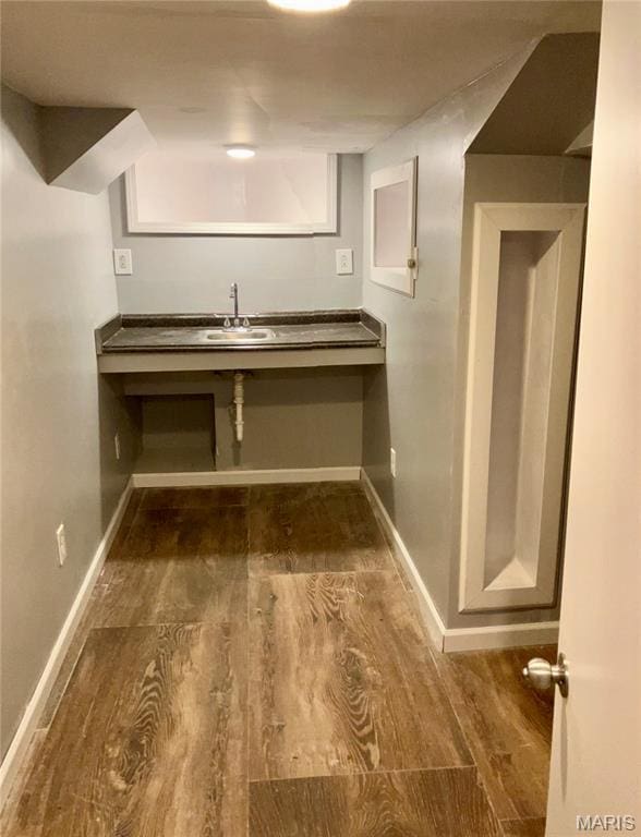 5379 Wabada Ave, Saint Louis, MO 63112 - kitchen featuring wood finished floors and baseboards