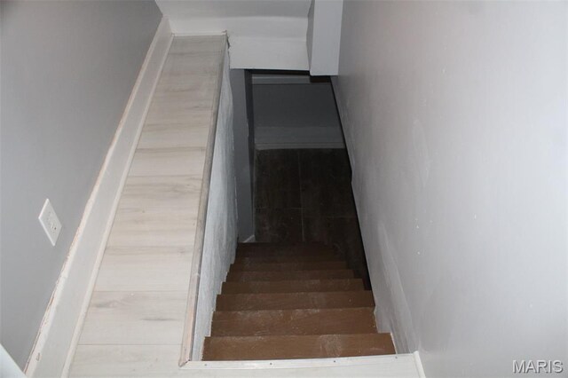 5379 Wabada Ave, Saint Louis, MO 63112 - stairs featuring wood finished floors