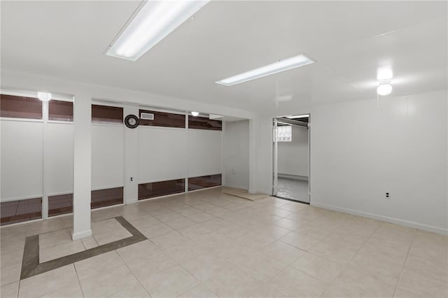6266 Marmaduke Ave, Saint Louis, MO 63139 - finished below grade area featuring tile patterned floors and baseboards