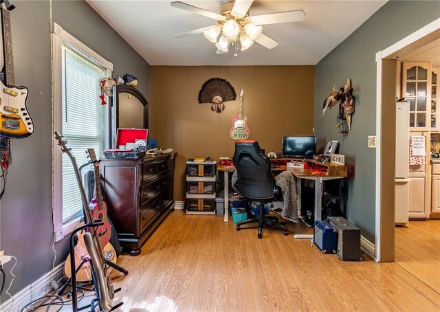 506 N Garfield, East Prairie, MO 63845 - office with a ceiling fan, light wood-type flooring, and baseboards
