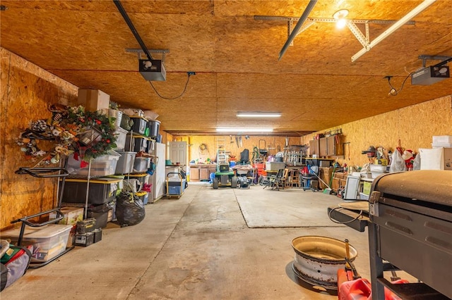 506 N Garfield, East Prairie, MO 63845 - garage featuring a garage door opener