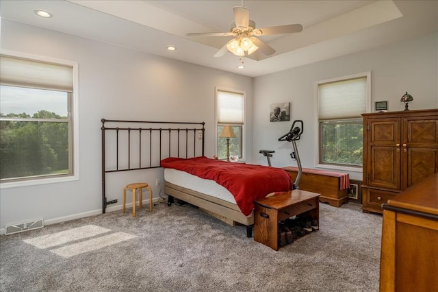 bedroom with carpet, multiple windows, recessed lighting, baseboards, and ceiling fan