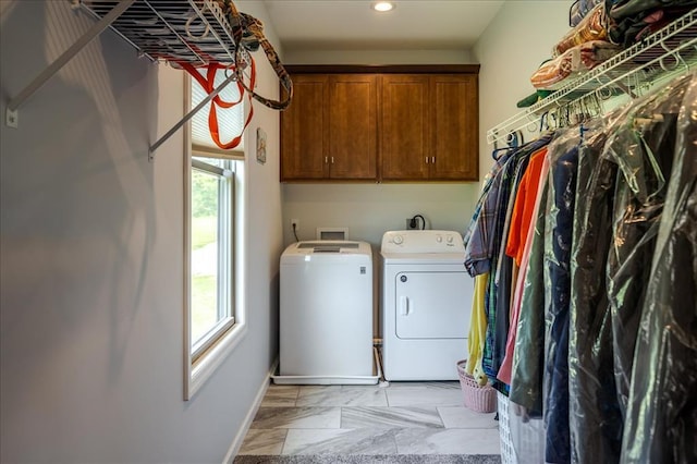 laundry area featuring washer and dryer, cabinet space, recessed lighting, and baseboards