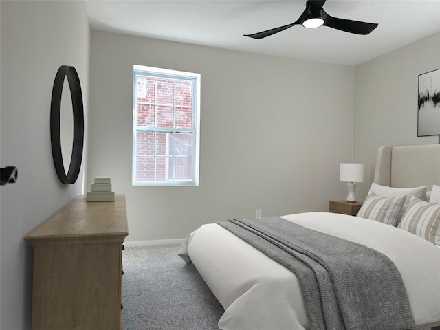 bedroom featuring carpet, baseboards, and a ceiling fan