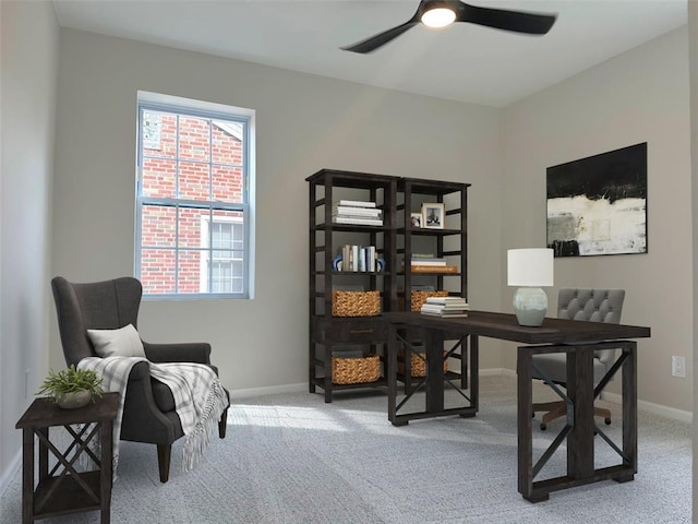 carpeted home office with baseboards and ceiling fan