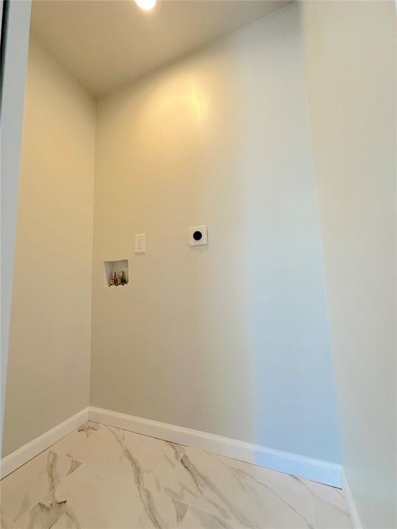 washroom featuring washer hookup, electric dryer hookup, marble finish floors, and baseboards
