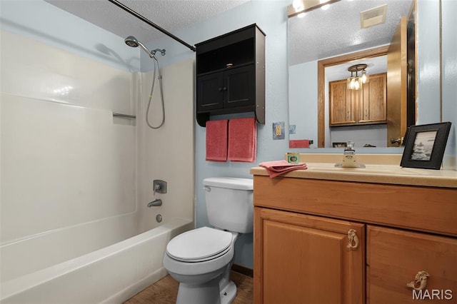 1380 Heritage Lndg Unit 105, Frontier Township, MO 63303 - bathroom featuring a textured ceiling, toilet, vanity, shower / bath combination, and wood finished floors