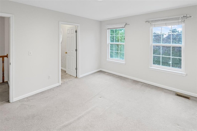 unfurnished bedroom with carpet floors and baseboards