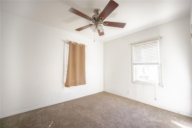 225 Haller Ave, East Alton, IL 62024 - unfurnished room featuring carpet, a ceiling fan, and baseboards