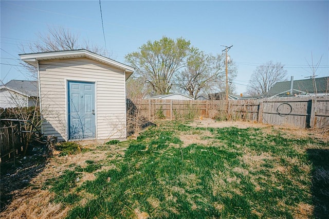 225 Haller Ave, East Alton, IL 62024 - fenced backyard with an outbuilding