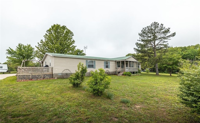 442 County Road 6250, Salem, MO 65560 - back of house with a sunroom and a lawn