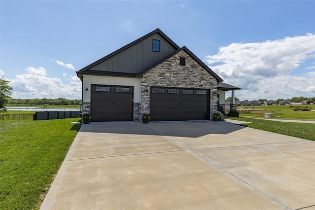 1099 Stonegate, Farmington, MO 63640 - view of front of property with stone siding, an attached garage, driveway, and board and batten siding