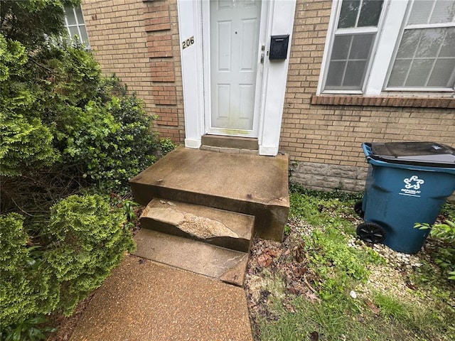 206 Thoroughman Ave, Ferguson, MO 63135 - doorway to property with brick siding