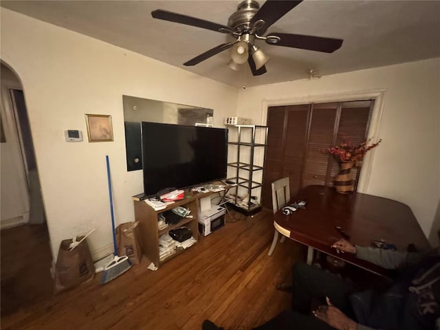 206 Thoroughman Ave, Ferguson, MO 63135 - living area featuring wood finished floors, ceiling fan, and arched walkways