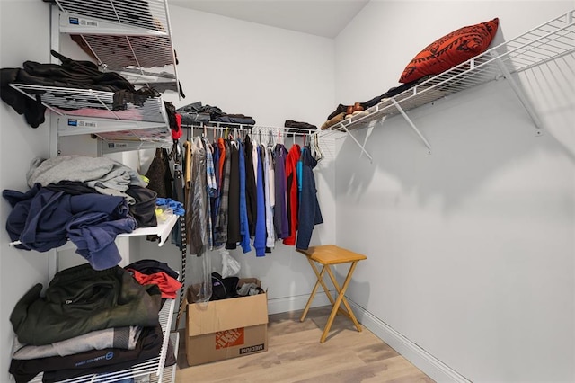 535 Crail Ct, Ofallon, MO 63368 - spacious closet featuring wood finished floors