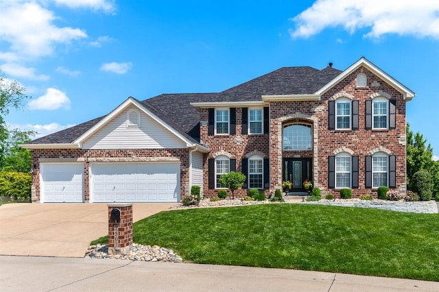 view of front of home with brick siding, driveway, and a front yard