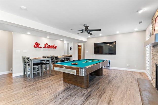 game room with wood finished floors, a fireplace, a ceiling fan, billiards table, and baseboards