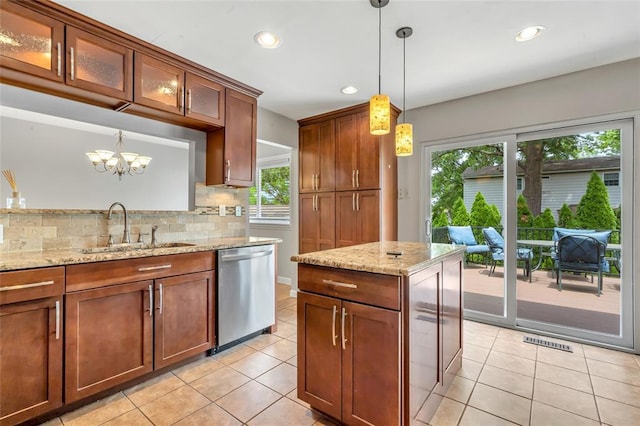 1137 Great Falls Ct, Manchester, MO 63021 - kitchen featuring dishwasher, healthy amount of natural light, a sink, light tile patterned floors, and recessed lighting