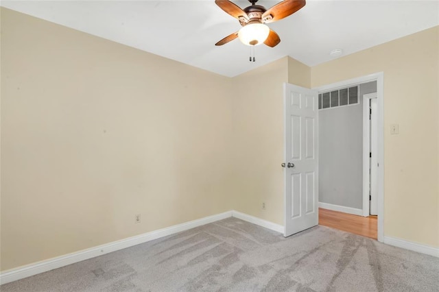 1137 Great Falls Ct, Manchester, MO 63021 - empty room with light colored carpet, a ceiling fan, baseboards, and a smoke detector