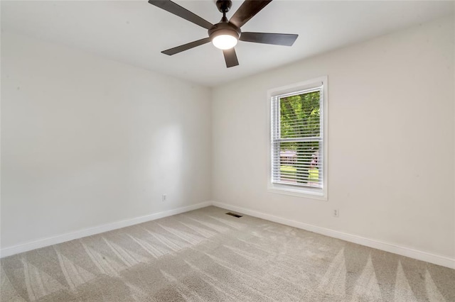 1137 Great Falls Ct, Manchester, MO 63021 - empty room featuring light carpet, baseboards, and ceiling fan