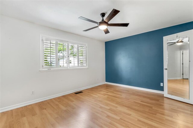 1137 Great Falls Ct, Manchester, MO 63021 - empty room featuring ceiling fan, light wood finished floors, and baseboards