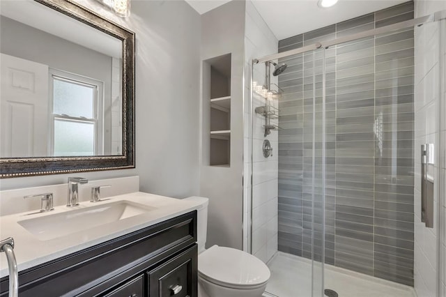 1137 Great Falls Ct, Manchester, MO 63021 - bathroom featuring vanity, a stall shower, and toilet