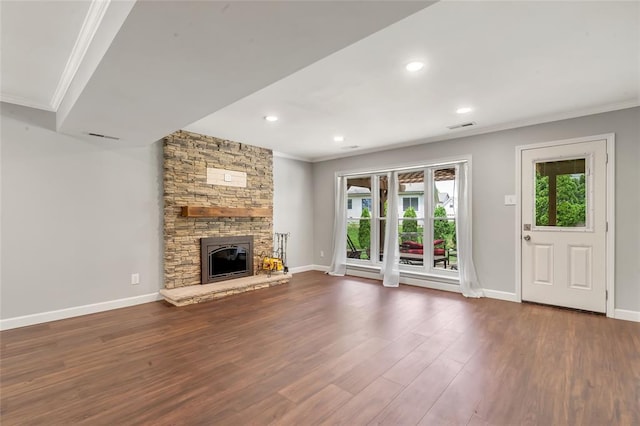 1137 Great Falls Ct, Manchester, MO 63021 - unfurnished living room featuring crown molding, plenty of natural light, wood finished floors, baseboards, and a fireplace