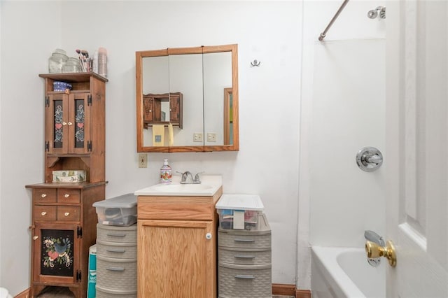 full bathroom featuring washtub / shower combination and vanity