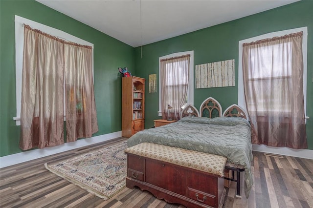 bedroom featuring wood finished floors