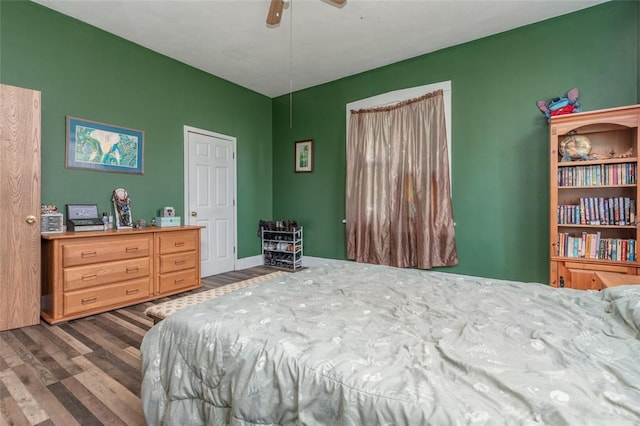 bedroom with wood finished floors and ceiling fan