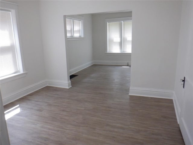 5335 Bancroft Ave, Saint Louis, MO 63109 - spare room featuring wood finished floors and baseboards