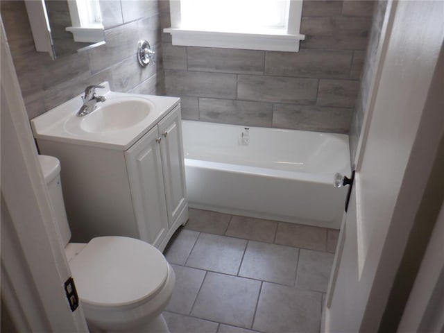 5335 Bancroft Ave, Saint Louis, MO 63109 - bathroom with toilet, vanity, and tile patterned flooring