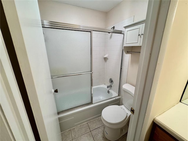 624 Coeur De Royale Dr Unit A, Creve Coeur, MO 63141 - bathroom with toilet, tile patterned flooring, and shower / bath combination with glass door