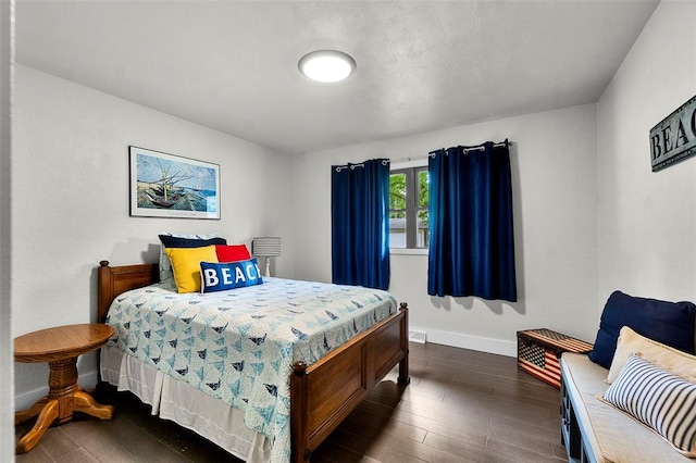 1719 Oak Hills St, Cape Girardeau, MO 63701 - bedroom with dark wood-style flooring and baseboards