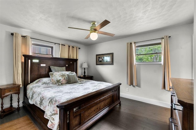 1719 Oak Hills St, Cape Girardeau, MO 63701 - bedroom featuring baseboards, a textured ceiling, dark wood finished floors, and a ceiling fan