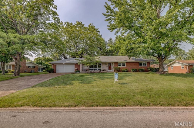 121 E Fairway Dr, Belleville, IL 62223 - ranch-style home with driveway, an attached garage, a front yard, and brick siding