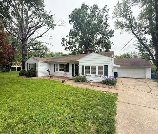 single story home featuring a garage, a front yard, and driveway