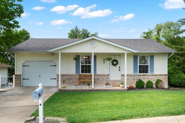 15 W 13th St, Washington, MO 63090 - single story home with covered porch, an attached garage, brick siding, and driveway