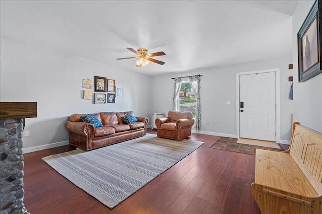 15 W 13th St, Washington, MO 63090 - living room with a ceiling fan, dark wood-type flooring, and baseboards