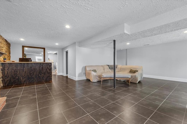 15 W 13th St, Washington, MO 63090 - tiled living room with a textured ceiling and baseboards