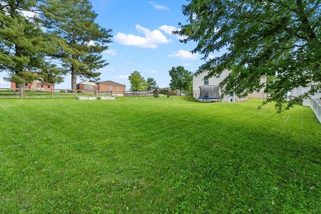 15 W 13th St, Washington, MO 63090 - view of yard featuring a trampoline