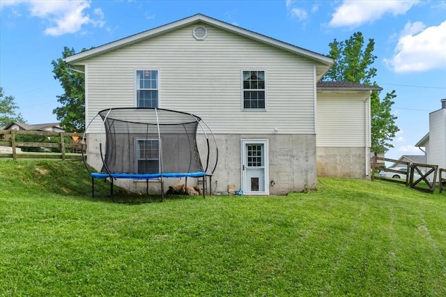 15 W 13th St, Washington, MO 63090 - back of property featuring a trampoline