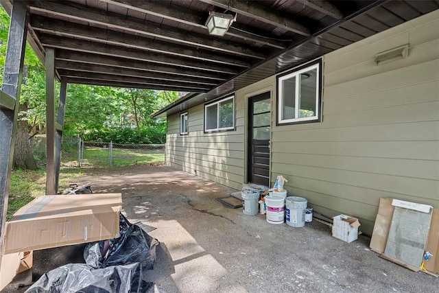 view of patio / terrace featuring fence