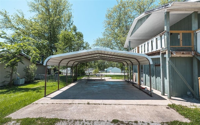108 College Ave, Licking, MO 65542 - view of parking with a detached carport and driveway