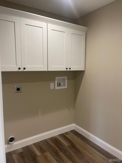 289 Broch Tuarach Pl, Jackson, MO 63755 - laundry area featuring electric dryer hookup, cabinet space, hookup for a washing machine, baseboards, and dark wood-style floors