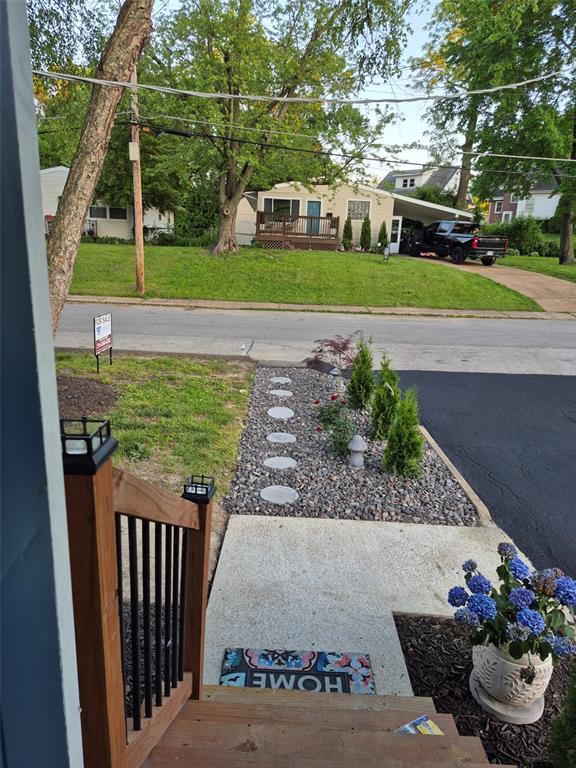9643 Holtwood Rd, Overland, MO 63114 - view of grassy yard