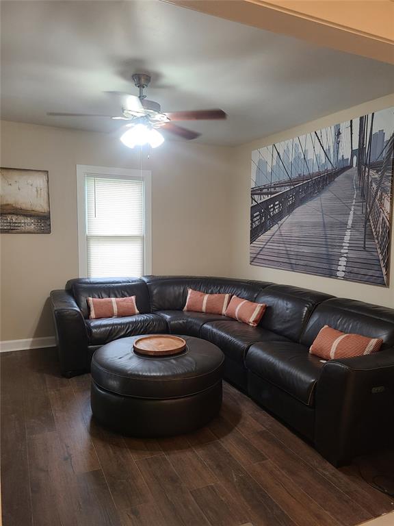 9643 Holtwood Rd, Overland, MO 63114 - living room with hardwood / wood-style floors, a ceiling fan, and baseboards